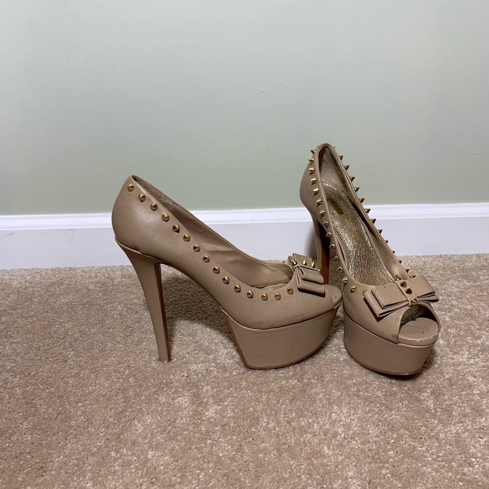 Wild pair tan heels with spikes